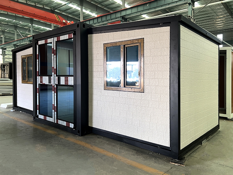 Double wing folding expansion house