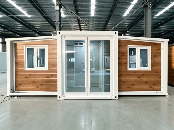 Double wing folding expansion house